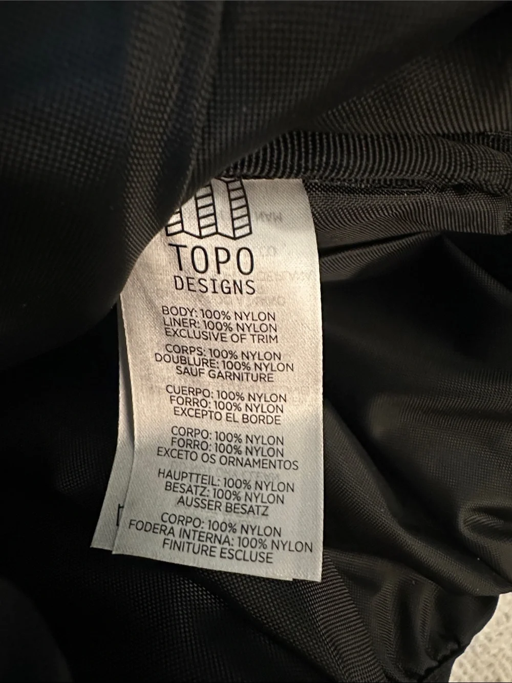 Topo Designs Mini River Green Canvas Backpack with White Zip Pocket